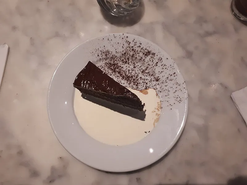 Home-made chocolate cake with chocolate fudge at Mamma Mia