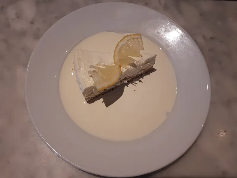 Home-made lemon cheesecake with cream at Mamma Mia