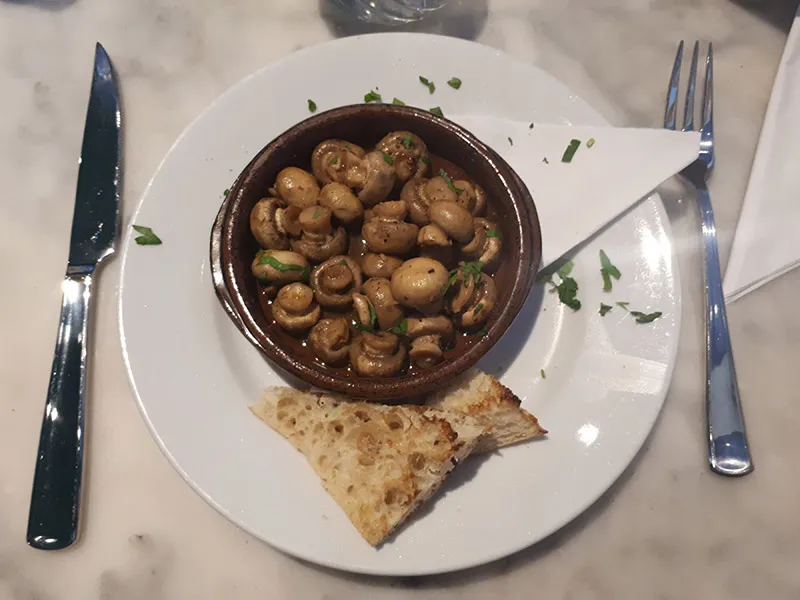 Funghi all'Aglio, pan-fried mushrooms in garlic butter and white wine